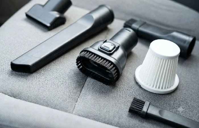 Car vacuum crevice tool and HEPA filter attachments laid out