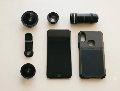 Best phone camera lens attachments for 2026 including clip-on wide-angle macro and telephoto lenses on a smartphone