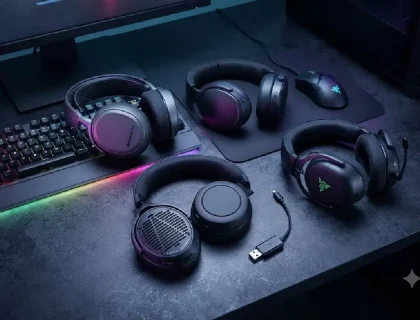 Five wireless gaming headsets for 2026 arranged on a gaming desk with RGB lighting